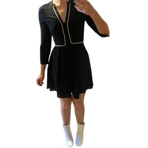 H&M black peasant style fit and flare dress